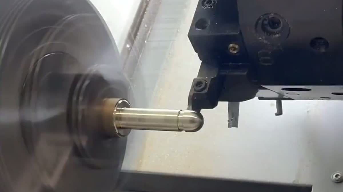CNC lathe cutting a workpiece end