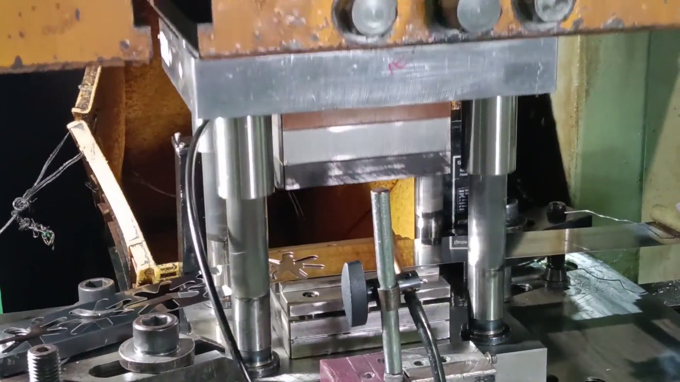 Press floor with in-process parts staged for verification